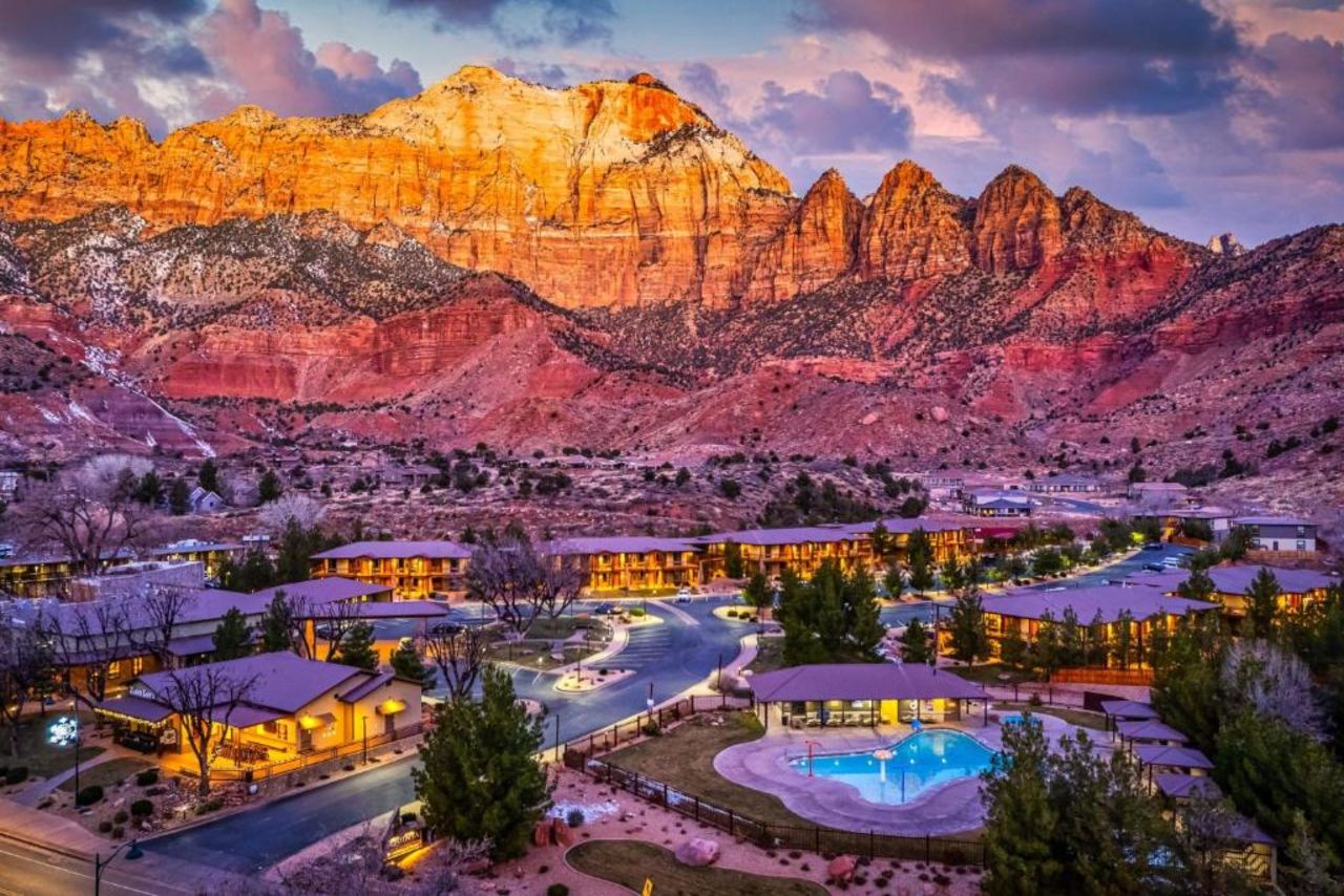 hotel surrounded by red rock mountains near Zion National Park in Utah
